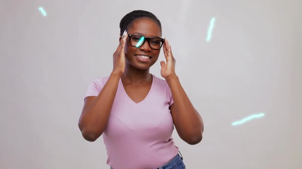 Happy Young Woman Dancing with Glowing Lines