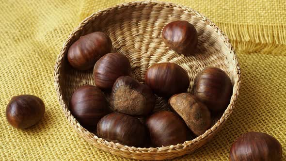 Fresh edible chestnuts in a basket