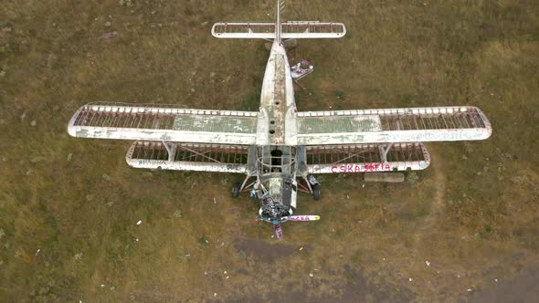 Old abandoned airplane in the field