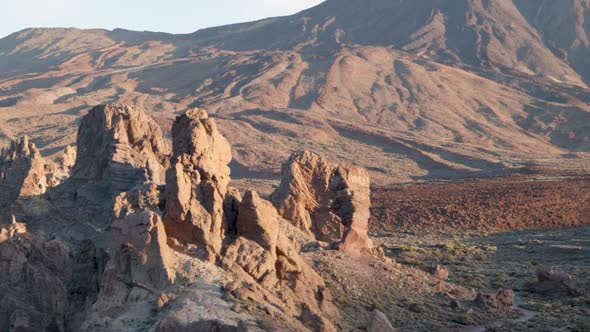 View of rocks and top of a volcano during sunrise in Teide National Park, Roques de García, Tenerife