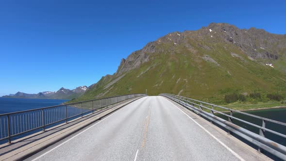 Driving a Car on a Road in Norway