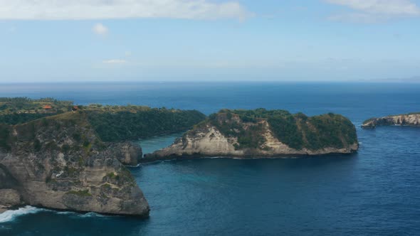 Aerial shot of beautiful rocks on the sea. Nusa Penida Island.