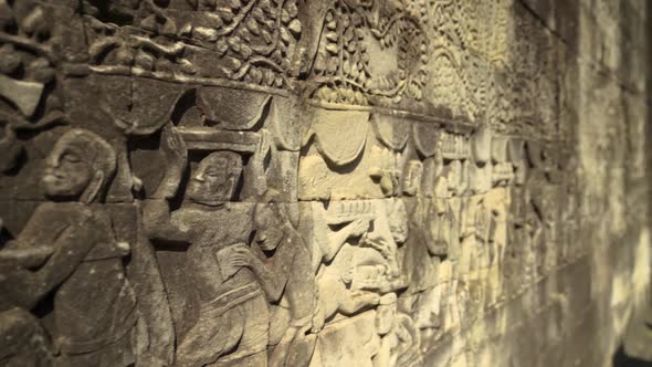 Close-up Ornate Details of Ancient Stone Bas-Relief in a Temple in Angkor, Cambodia