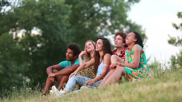 Group of friends having a great time taking selfies