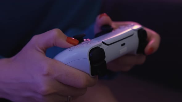 Close Up Shot of Young Woman Playing Game Online at Home