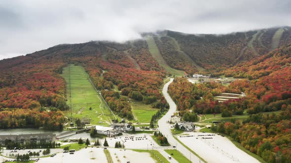 Mountain Resort with Scenic Fall Foliage Forest Landscape Background Autumn Day