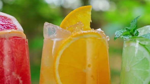 Mix Of Three Ice Refreshing Drinks With Orange, Lime And Grapefruit Cold Refreshing Cocktails