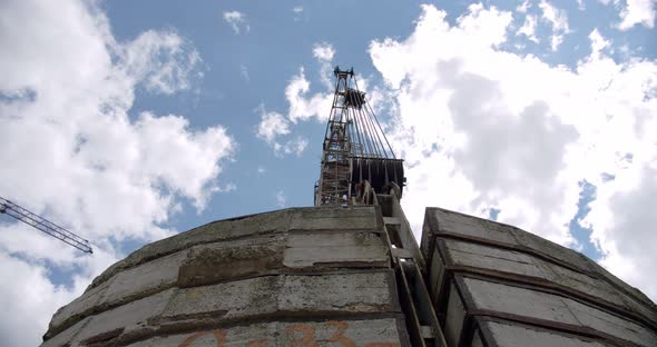 Crane Rotate at Building Construction Site, Architecture Apartments, Wide Shot