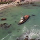 Drone Flies Around Ship Wreck in Ocean in Cayucos - VideoHive Item for Sale