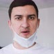 Young Man of European Appearance in a Medical Mask - VideoHive Item for Sale