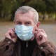 Close Up Portrait of Senior Man Wearing Protective Medical Face Mask.  - VideoHive Item for Sale