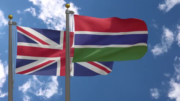 United Kingdom Flag Vs The Gambia Flag On Flagpole