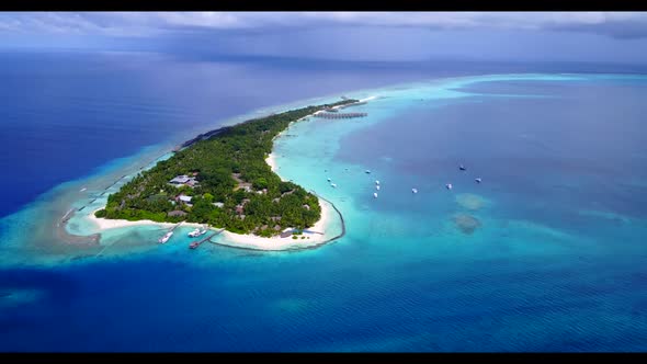 Aerial above abstract of idyllic coast beach journey by aqua blue sea and white sand background of a