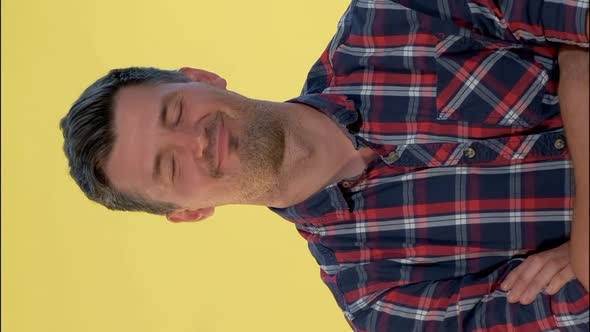 Close-up of Handsome Man Promising To Keep Silence