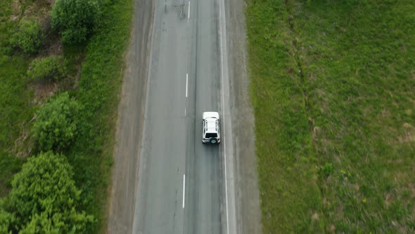 Top View of a Car Driving on the Highway