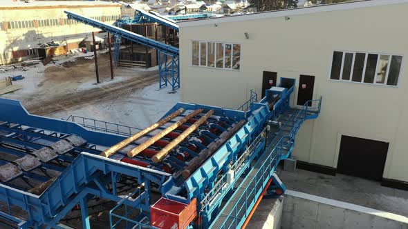 Aerial View of Automated Log Sorting Line. Production of Timber From Wood. Woodworking. Machining