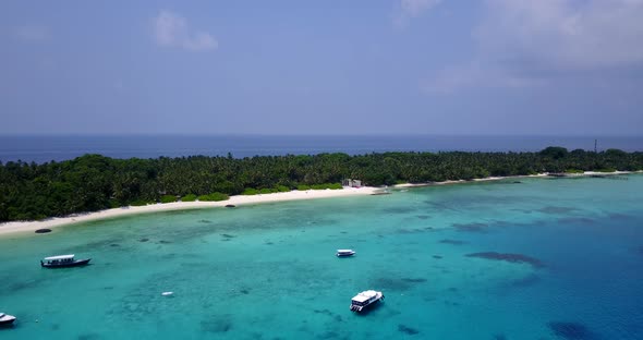 Wide angle fly over abstract view of a sunshine white sandy paradise beach and blue sea background i