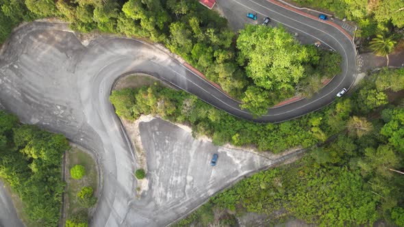 Aerial view of road and parking which are next to Jeram Toi waterfall