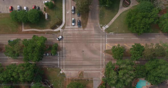 Birds eye view of cars at street intersection
