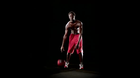 Man Play Basketball Isolated on Black