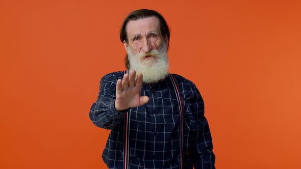 Elderly Bearded Grayhaired Man Say No Stop Gesture Warning of Finish Prohibited Access Declining