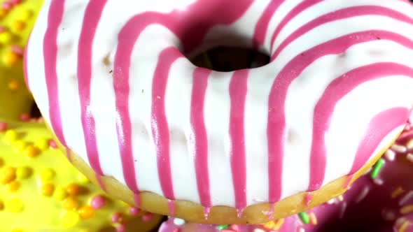 Rotating Donuts with Different Fillings on the Table