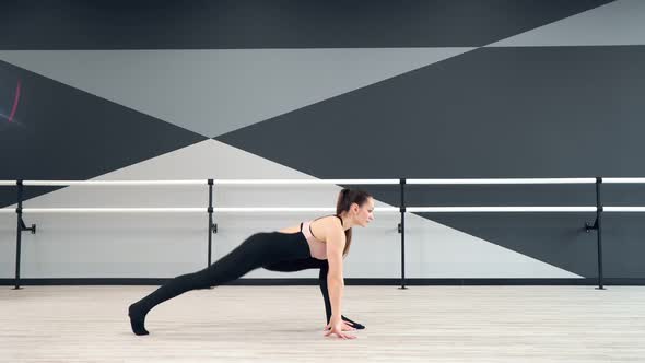 Woman Stretching Leg in Reverse Lunge