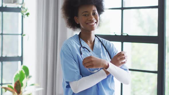 Portrait of smiling african american female doctor with stethoscope on the neck