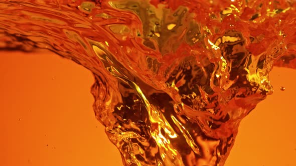 Super Slow Motion Shot of Golden Liquid Vortex at 1000 Fps