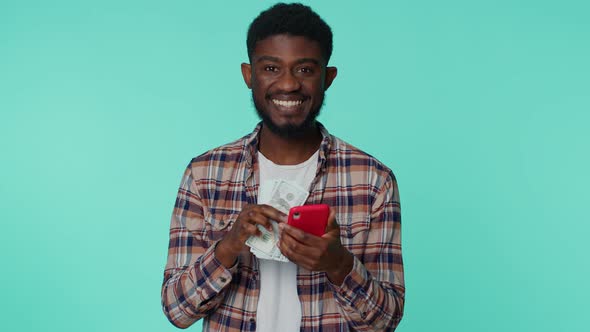 Happy African American Man Mobile Phone Display Sincerely Rejoicing Win Receiving Money Dollar Cash