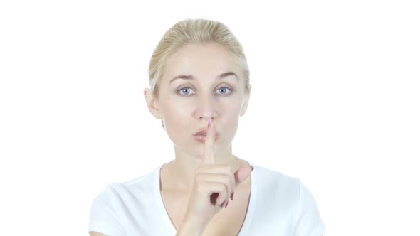 Young Girl Showing Gesture of Silence