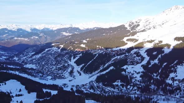Aerial View of the Alps Mountains in France, Mountain Tops Covered in Snow, Alpine Ski Facilities
