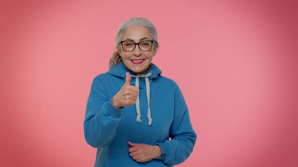 Senior Old Granny Woman Raises Thumbs Up Agrees with Something or Gives Positive Reply Likes Good