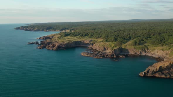 Drone flight around a picturesque rocky coastline