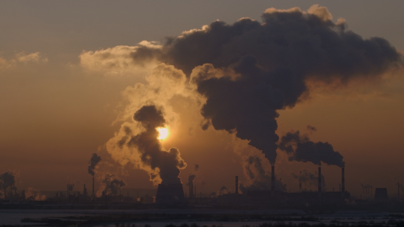 Sun over the Smoking Thermoelectric Power Plant