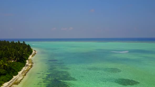 Aerial drone scenery of resort beach by lagoon and sand background