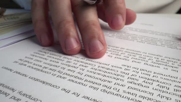 Businessman Sign Signature on Document Contract Paper at Office Desk