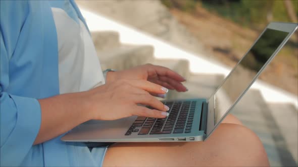 Woman Working on the Laptop, Attractive Brunette in a Blue Suit With a Laptop, Attractive Woman