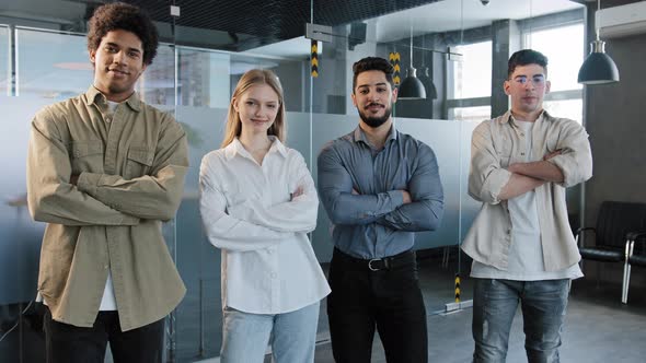 Happy Proud Professional Group Diverse Business People Stand in Office with Their Arms Crossed Smile