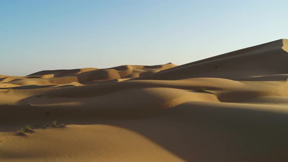 Aerial view of Dubai desert at sunset, United Arab Emirates.