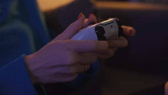 Close Up Shot of Young Woman Playing Game Online at Home