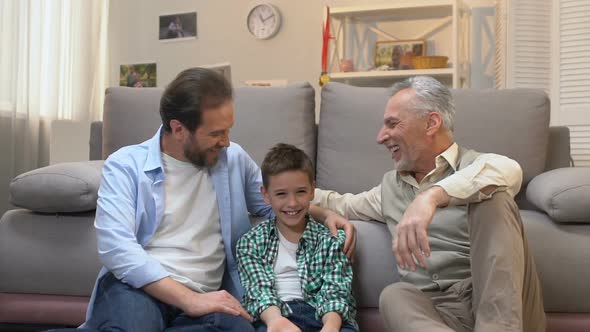 Happy Grandfather Enjoying Pastime With His Son and Grandson, Slow-Motion