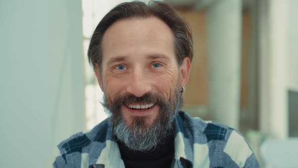 Portrait of Smiling Senior Adult Man with Beard