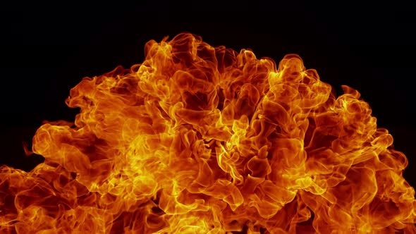Super Slow Motion Detail Shot of Fire Explosion Against the Black Wall at 1000Fps