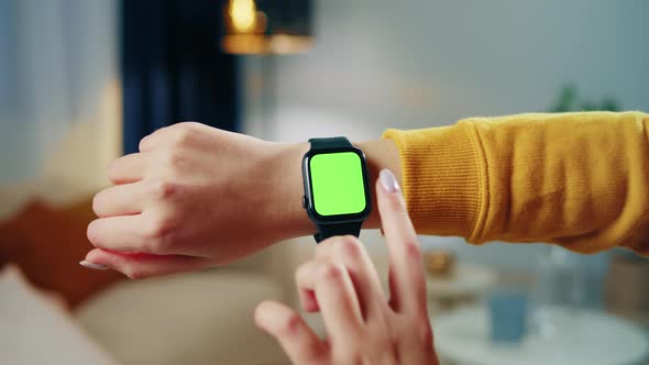 Woman Using Smartwatch with Chroma Key Closeup