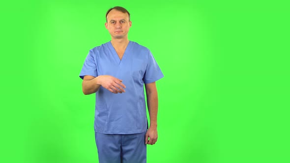 Medical Man Waving Hand and Showing Gesture Come Here, Green Screen