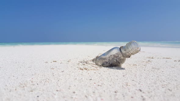 Wide fly over abstract shot of a white paradise beach and turquoise sea background in 4K