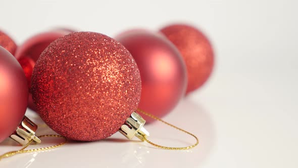 Red decoration baubles for Christmas holiday slow tilt 4K video