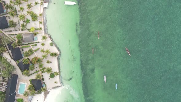 Tanzania Vertical Video  Boat Boats in the Ocean Near the Coast of Zanzibar Aerial View