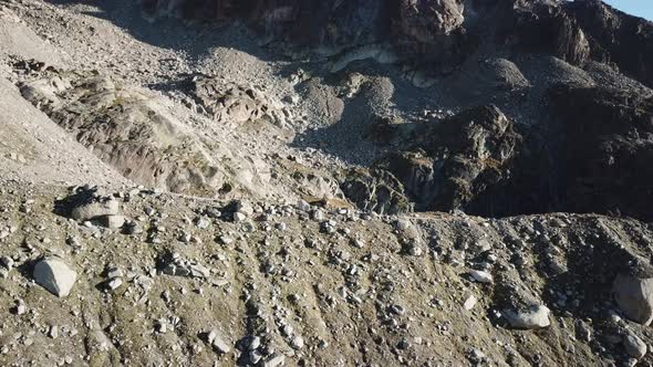ridge of a rocky mountain in the swiss alps, aerial drone view. cabane d'Orny